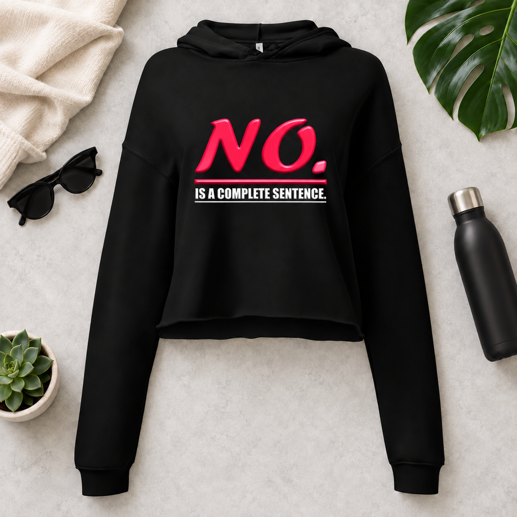 Black women’s cropped hoodie with glossy pink “NO.” lettering and white “IS A COMPLETE SENTENCE.” slogan.