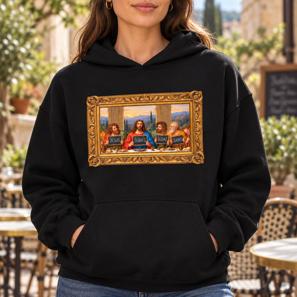 Unisex hoodie featuring The Original Round Table Last Supper parody in a gold frame, with JESUS and JUDAS chalkboards.