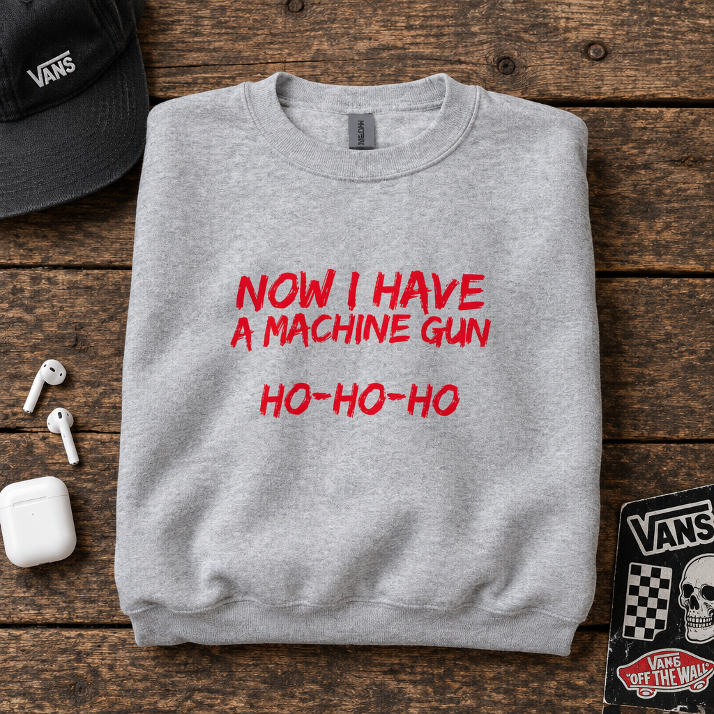 Now I Have a Machine Gun funny Christmas sweatshirt – festive graphic detail
