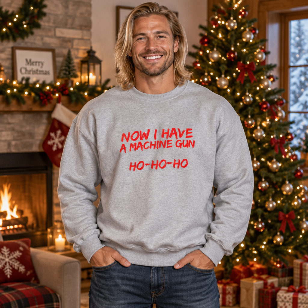Now I Have a Machine Gun funny Christmas sweatshirt – festive graphic detail